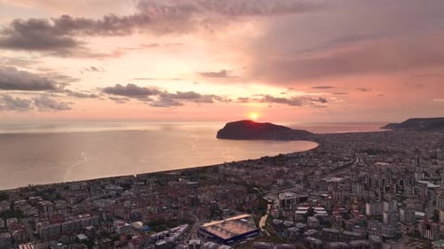 Aerial View Turkish Cityscape Against a Sunset with Pink Clouds