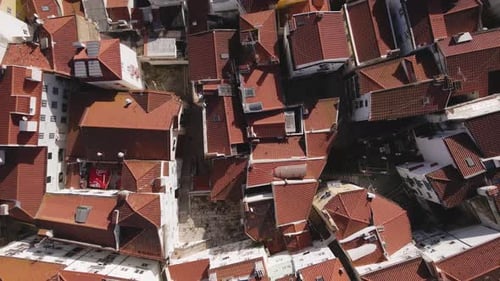 Aerial view of rooftops and narrow streets, Portugal.