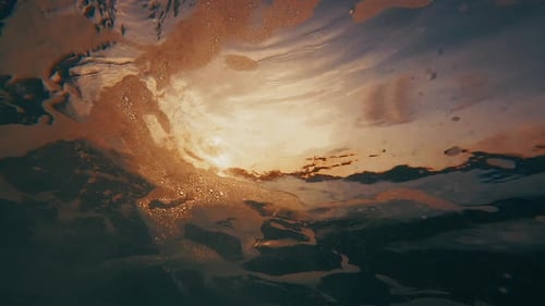 Underwater view of the breaking wave in the Maldives