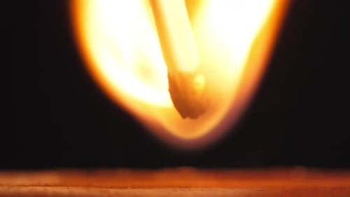 Extreme Close Up of Match Burning and Extinguishing