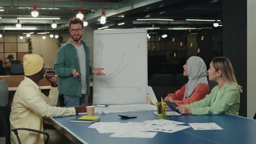 Diverse Team Meeting Presentation Success