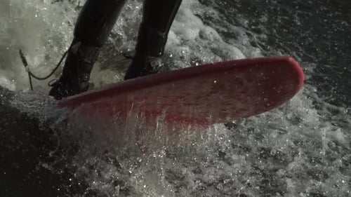 Ramped slow motion ollie on a surf board jump in the water.mov