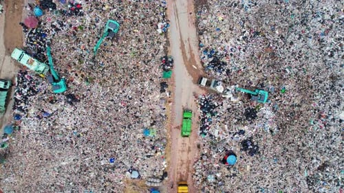 Aerial view from a drone flying over a large pile of garbage