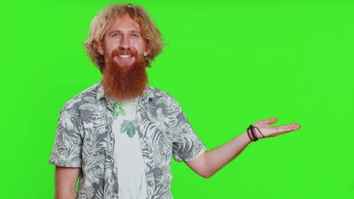 Young Man Showing Thumbs Up and Pointing at Right on Blank Space Place for your Advertisement Logo