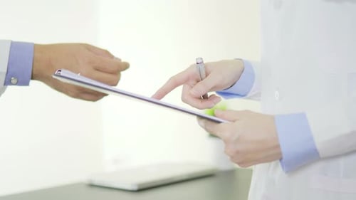 Doctor Explains Medical Results to Patient