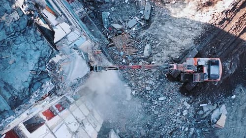 Natural disaster demolition building. Earthquake house destroyed aerial view.