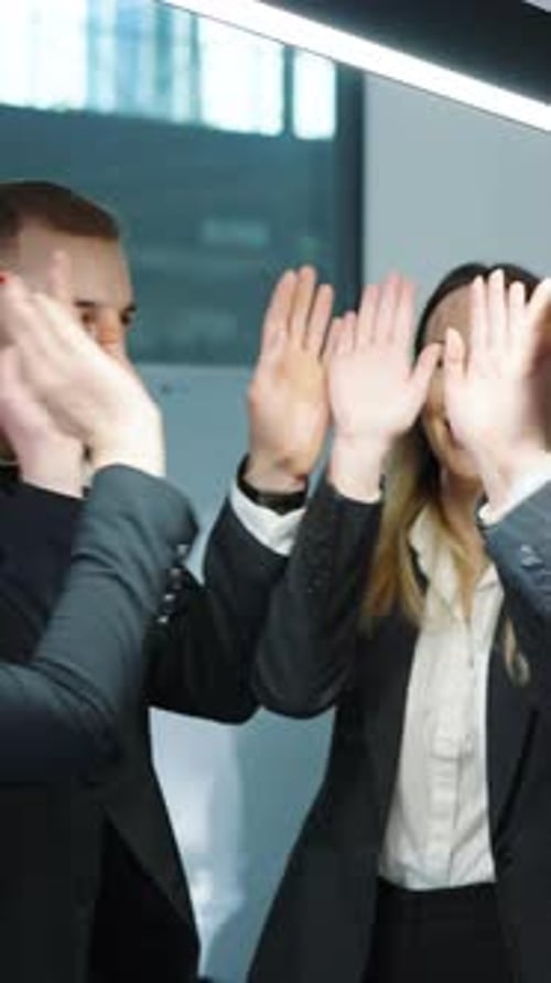 Vertical Screen Business Team Celebrating Success Putting Hands Together