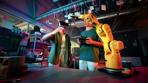 Young Adults Operating Robotic Arm with VR and Remote
