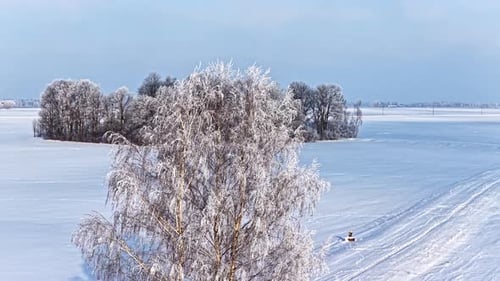 Snowy Winter Wonderland: Drone View of Frozen Landscape