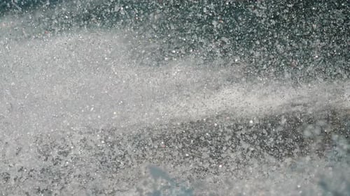 Splashes of Water on Lake After Fast Transport Movement