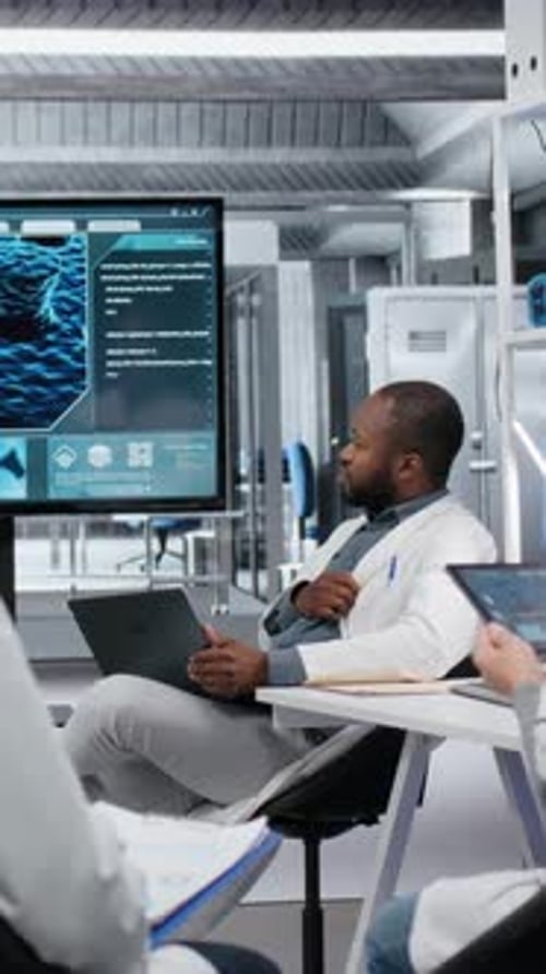 Vertical Video Laboratory Manager Presenting Innovative Drug Development Findings