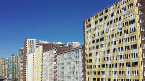 Aerial View of Colorful Modern Apartment Buildings on Sunny Day