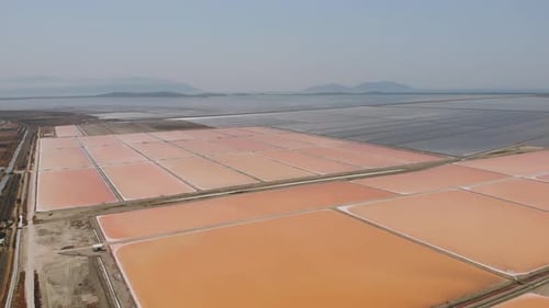 Aerial View Above Red Salt Production Pools in Albania Drone Shot