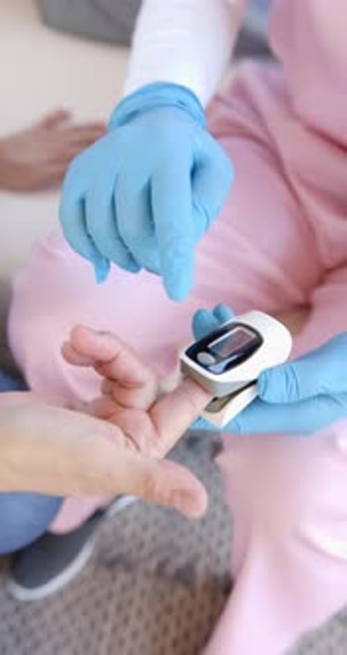 Pulse Oximeter Reading on Patient's Finger