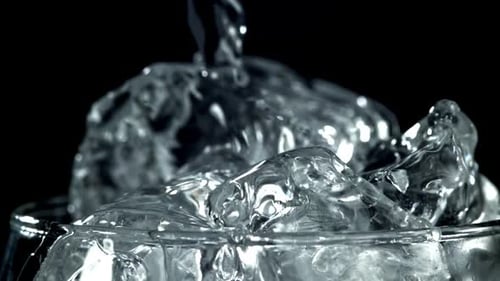Water Over Ice Fills Clear Glass