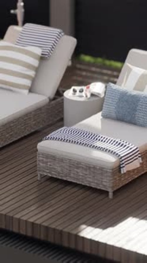 Exterior design details, close-up shot, two sun loungers by the pool.