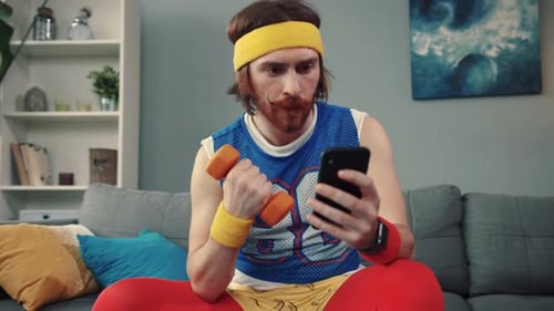 An Athlete in Retro Gear is Engaging with Their Smartphone Showing Energy in a Modern Lifestyle