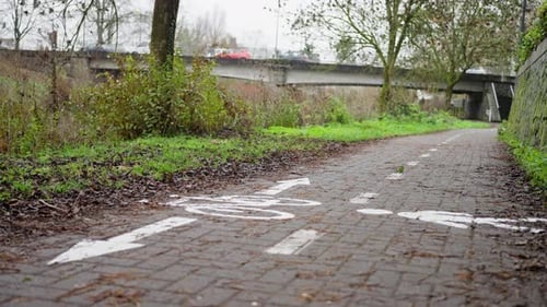 Wet Path Signage Directional Symbols and Lines Guiding Walkers and Bike Riders Effectively