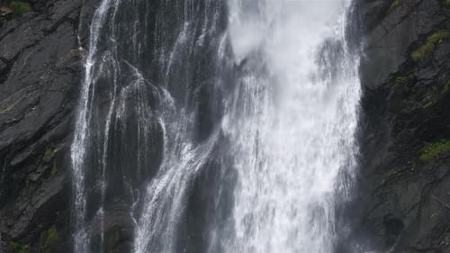 Water Falling Over Dark Rocks, Peaceful Waterfall