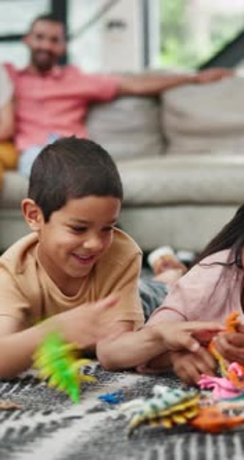 Children, toys and playing together in a family home for development, learning and bonding