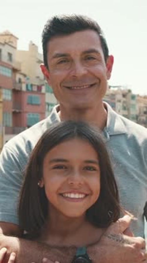 Happy Girl and Man Smiling Together