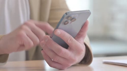 Close up of Male Hand Using Smartphone