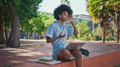 Student Talking Video Call Using Laptop Sitting Street African Girl Speaking