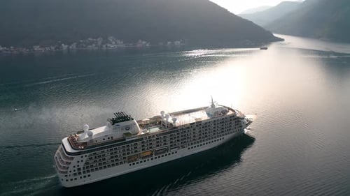 Large cruise ship passing through the picturesque bay of Kotor in Montenegro