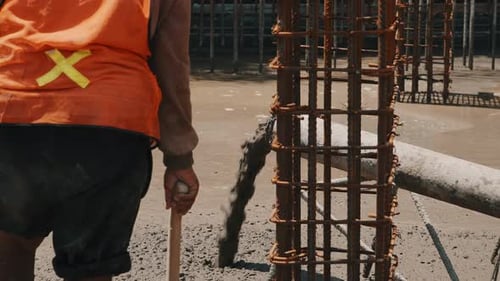 Concrete Pouring on Reinforced Foundation Closeup