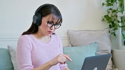 Woman Working From Home on Laptop