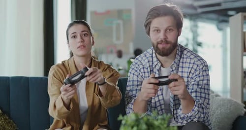 Couple Playing Video Games Together on Couch