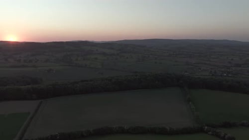 Aerial View of Rural Landscape at Sunrise
