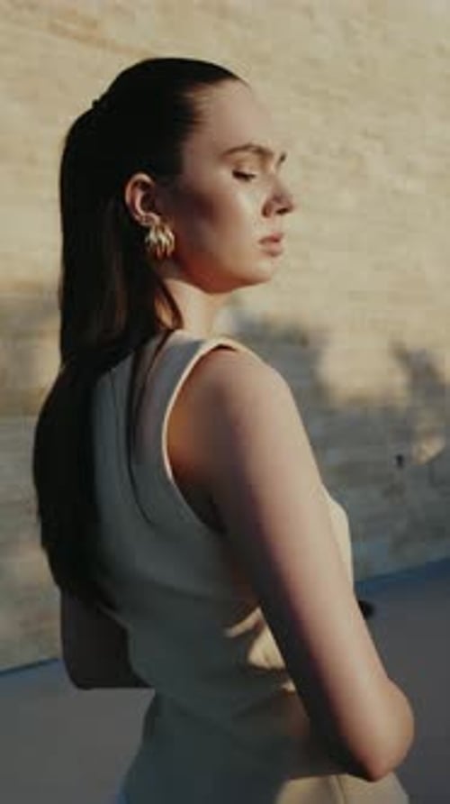 Elegant Woman Posing in Stylish Outfit Outdoors