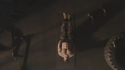 Shirtless Man Workout in Gym Overhead View