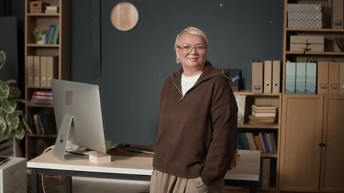 Portrait of Confident Middle-Aged Businesswoman in Office