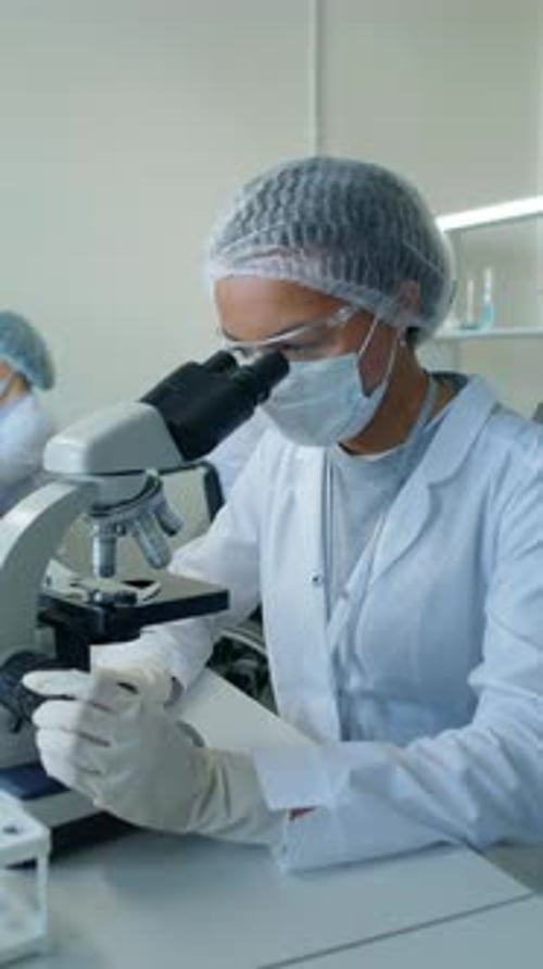 Young Adults Conducting Scientific Research in a Laboratory