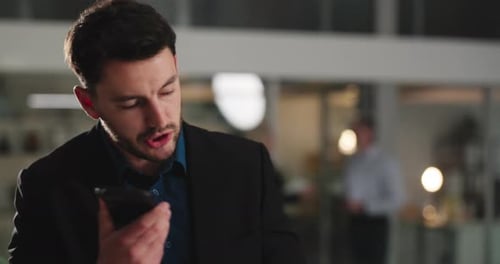 Office, speaker phone and businessman at night for recording notes, negotiation