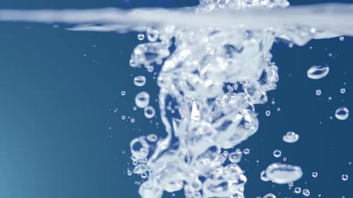 Bubbles Rising in Clear Blue Tinted Water