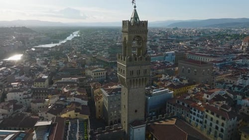 Cinematic Aerial Footage of Historic Palazzo Vecchio Tower Above Old Town Centre in Famous Tourist