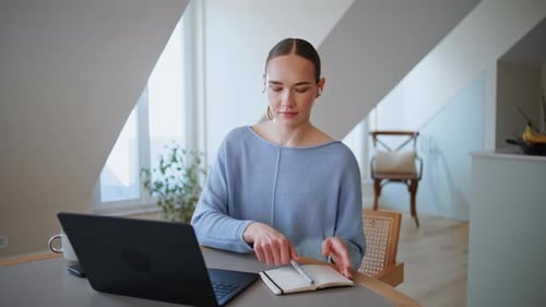 Woman Working at Home on Laptop, Video Call