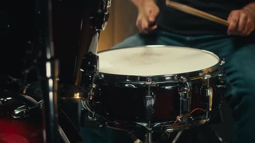 Expressive Drummer Young Man Professionally Playing on Dums in Studio Room Closeup Rock Metall Music