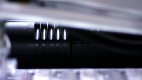 Automated machinery component moves up and down