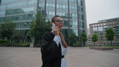 Business Woman Talking on Phone in City Environment