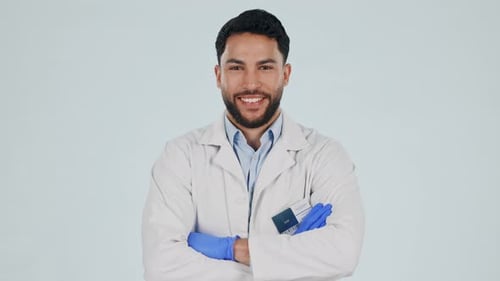 Thumbs up, medical doctor or a man in studio for agreement, approved and good review