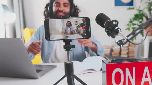 Man Recording Video for Channel at Home
