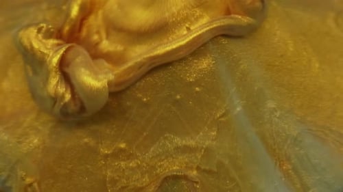 Shimmering Gold Liquid Abstract Motion