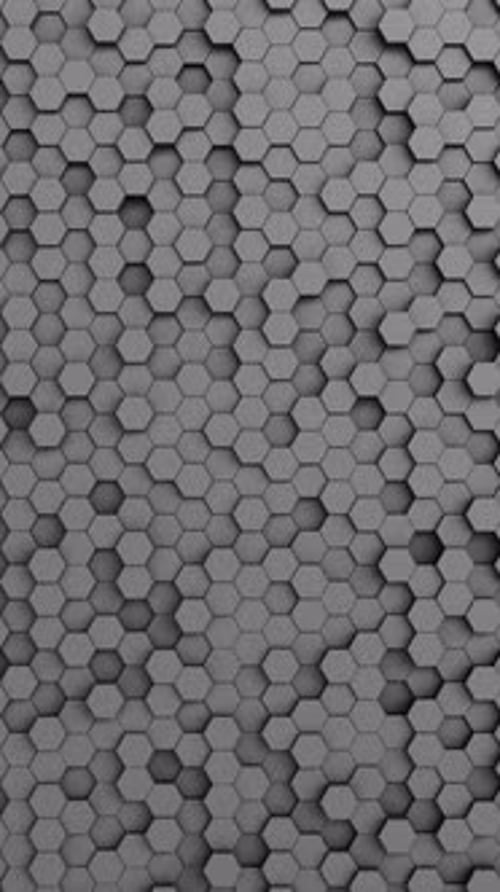 Animación 3D en bucle de un patrón hexagonal gris mate.