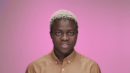 Man Smiles at Camera Close Up Portrait