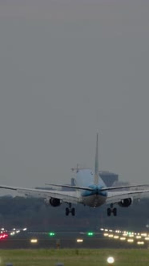 Big Passenger Airplane Landing at Airport Runway
