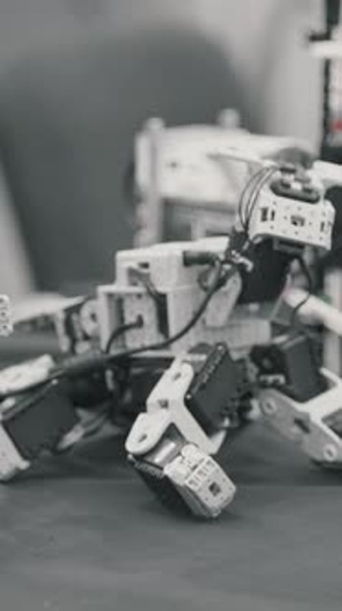 A close up of a spider-like moving robot